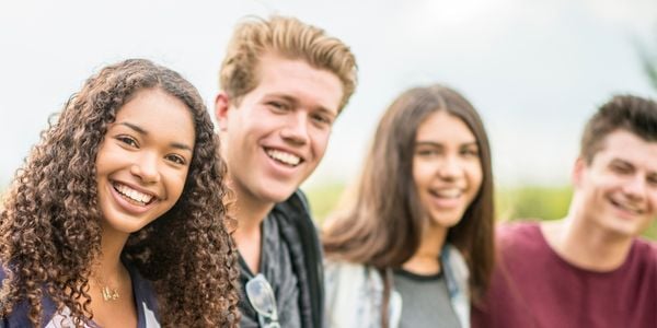 Smiling teens outdoors